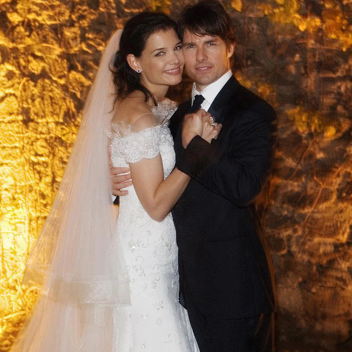 Katie Holmes and Tom Cruise early 2000s wedding dresses