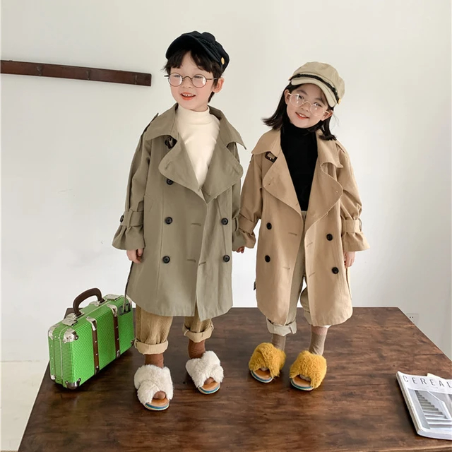 two kids in a trench coat